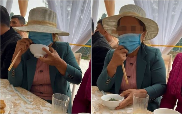 Ăn cỗ cưới mùa dịch, người phụ nữ cẩn thận đeo cả khẩu trang, kéo lên ăn xong lại vội kéo xuống Ảnh 2