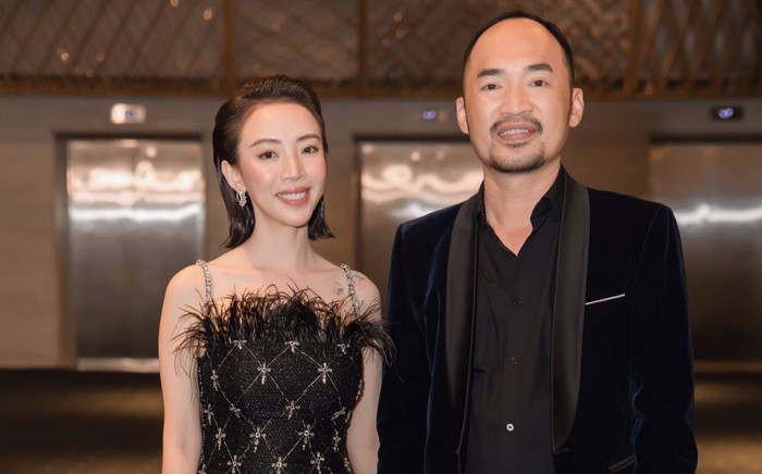 Đầu tư như Thu Trang: Một sự kiện thay hai bộ váy gợi cảm, Tiến Luật nắm chặt tay không buông Ảnh 2