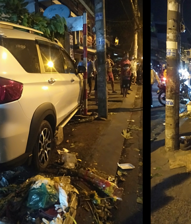 Chiếc ô tô sau khi gây tai nạn còn tông ngã một gốc cây nhỏ rồi mắc kẹt vào cột điện và bậc thềm nhà dân. 