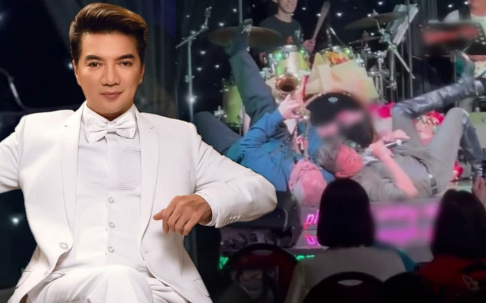 Đàm Vĩnh Hưng gây tranh cãi khi vừa hát vừa nằm lên người nam nhạc công Ảnh 2