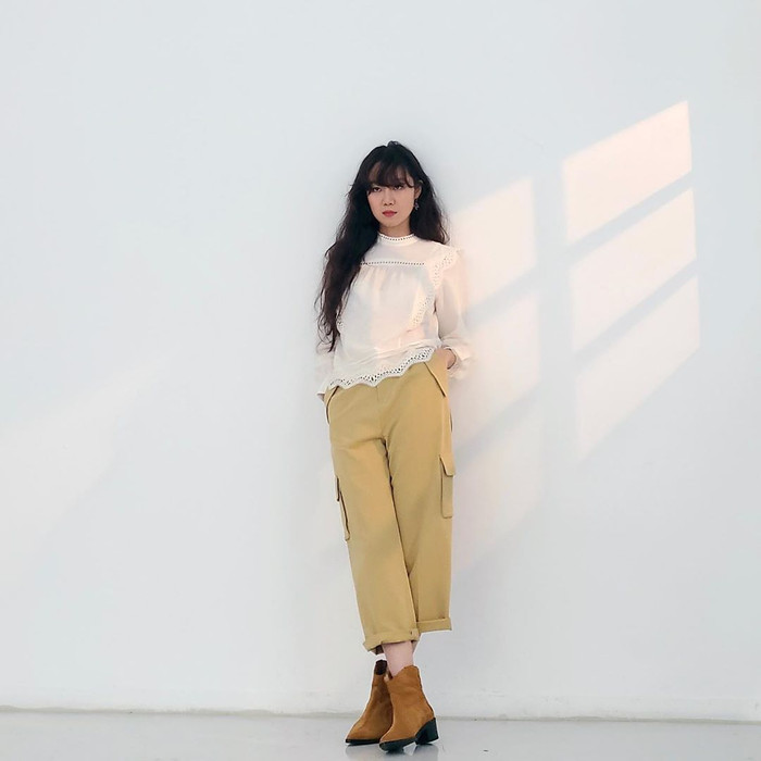 “Bảo chứng rating” của truyền hình Hàn Quốc được khán giả nhớ nhất với hình ảnh retro từ mái tóc dài uốn xoăn phối cùng trang phục đa sắc. 