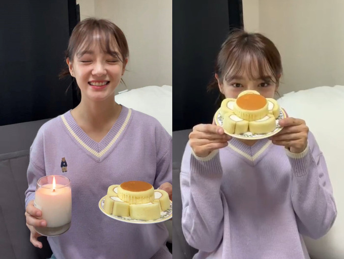 Se Jeong cầm nến và bánh kem chúc mừng cùng fan tại buổi Vlive.