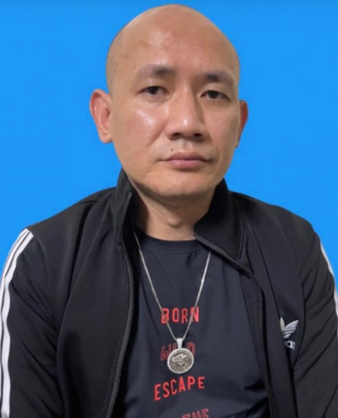 Đối tượng Thạch Anh Quân, tức 'Quân trọc' - người cầm đầu đường dây cho vay nặng lãi 'khét tiếng' ở Hà Nội. (Ảnh: Công an Nhân dân)