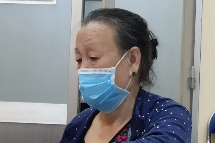 Bà Lê Thị Dư tại cơ quan công an. Ảnh: A.X/Dân Trí