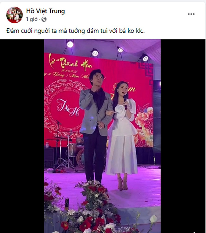 Hồ Việt trung và Hòa Minzy khoác tay thân thiết trong đám cưới Hồ Tấn Tài.