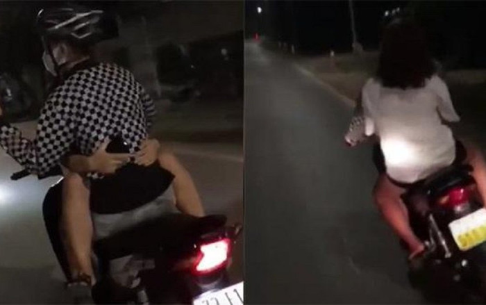 Phản cảm cảnh cô gái ngồi ngược ôm chặt bạn trai rồi lạng lách, đánh võng trên xe máy Ảnh 2