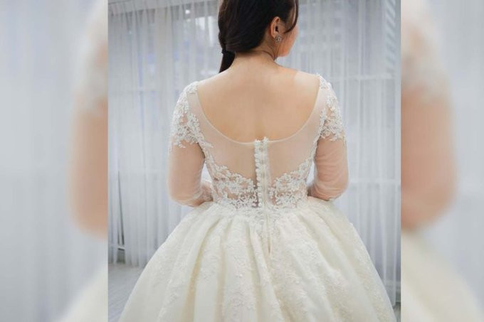 Cô dâu bị kiện vì chê studio chụp ảnh cưới 'trông béo'. Ảnh minh họa: SMCP
