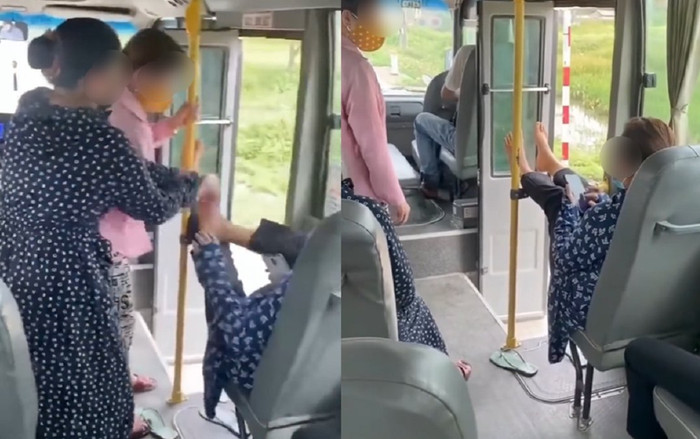 Gác chân lên thanh chắn xe buýt bị nhắc nhở, hành động cố chấp của người phụ nữ gây bức xúc Ảnh 2