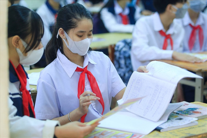 Bộ GD&Đ đề xuất miễn toàn bộ học phí cho học sinh THCS trên toàn quốc. Ảnh minh họa/ Báo Lao Động