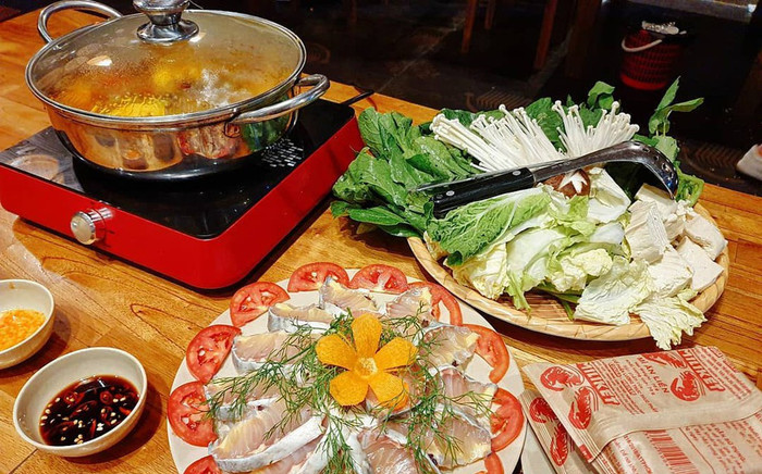 Lẩu cá tầm - món ngon khi du lịch Lào Cai Ảnh 2