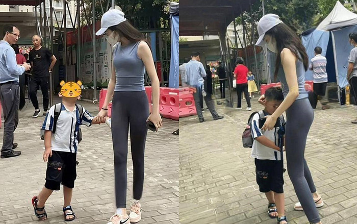 Người mẹ mặc đồ tập bó sát cơ thể đến đón con trai, có thái độ ngạc nhiên khi bị mọi người 'săm soi' Ảnh 2