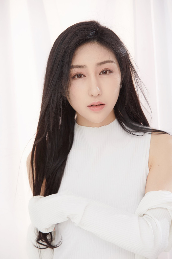 Trương Quân Trúc.