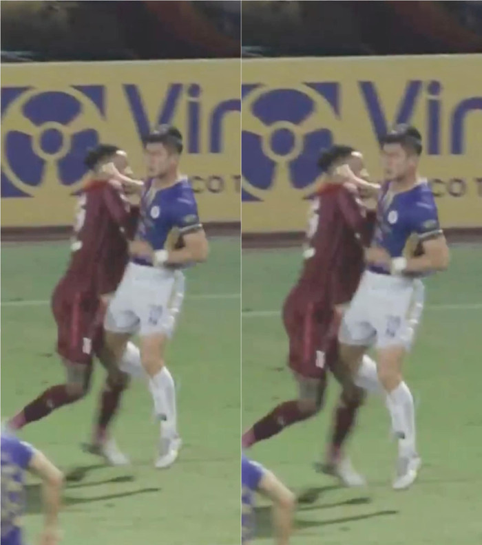 Duy Mạnh đánh đối thủ.