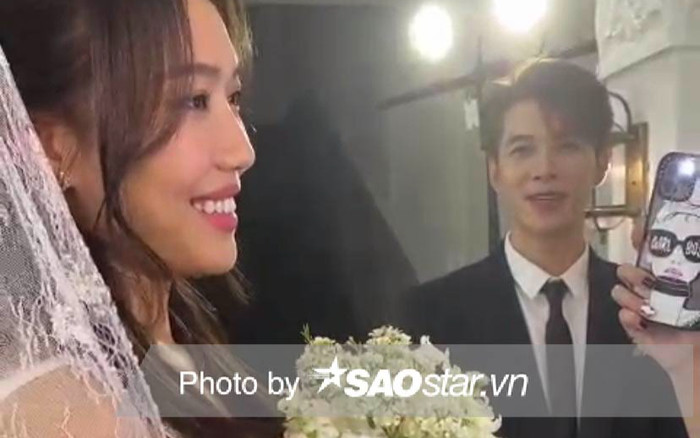 Anh Tú hào hứng hướng dẫn Diệu Nhi tạo dáng chuẩn 'cô dâu mới' tại hôn lễ ở Hà Nội Ảnh 2