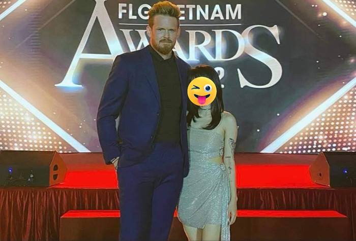 Chồng hợp pháp của Elly Trần bên cạnh cô gái được cho là 'tiểu tam'.