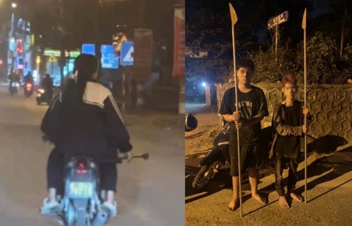 Hình ảnh các đối tượng vác dao phóng lợn đi trong đêm.