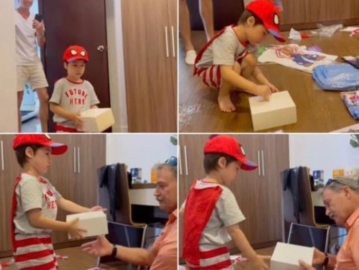 Khi gặp lại ông, bé Max mang hộp quà tới tặng ông nội. Cậu bé dùng hai tay nâng niu hộp quà có đựng chiếc đồng hồ vào tặng ông nội.