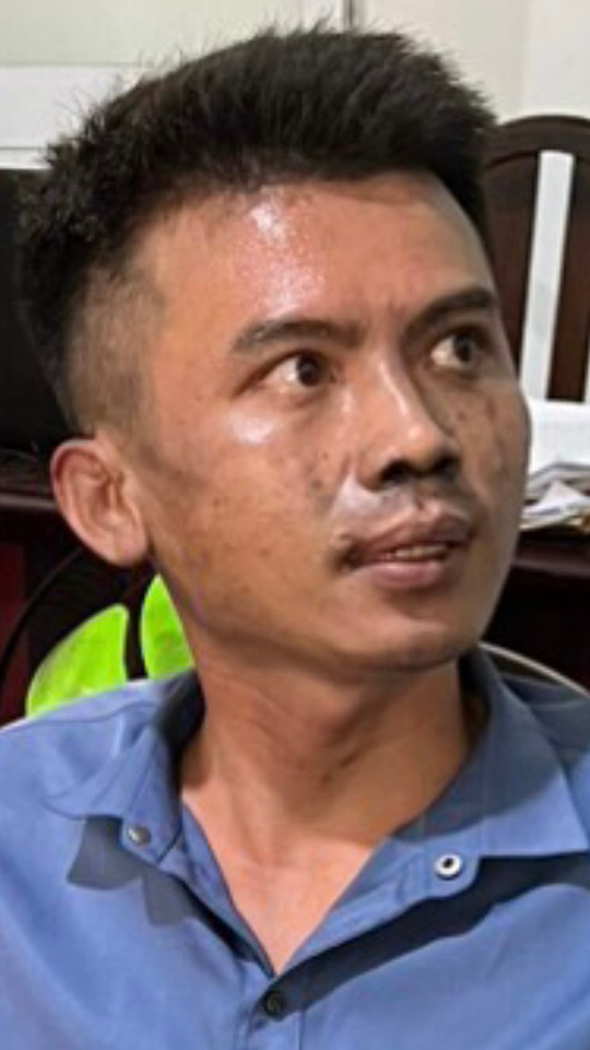 Nghi phạm  Trần Dương Tú tại cơ quan công an