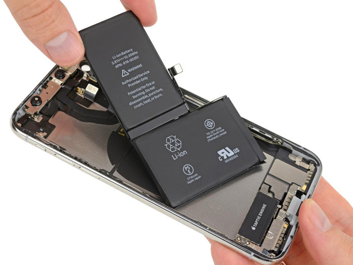 Ngỡ ngàng với chi phí thay pin iPhone tăng mạnh Ảnh 1