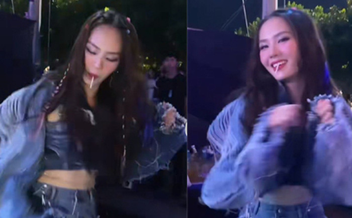 Hình ảnh Hoa hậu Mai Phương vừa ngậm kẹo mút, vừa nhún nhảy tại một sự kiện bất ngờ lan truyền với tốc độ chóng mặt trên mạng xã hội.