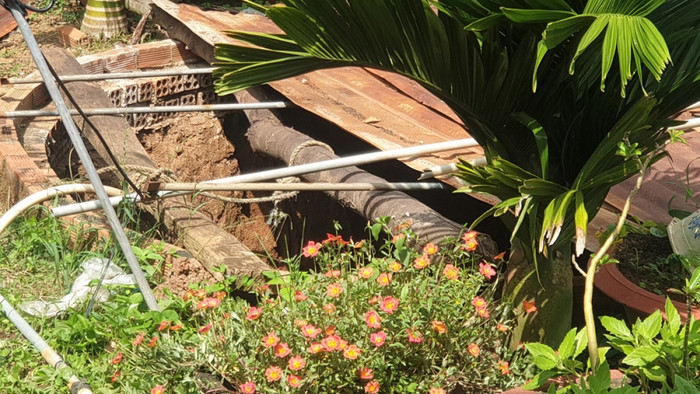 Giếng nước nơi phát hiện thi thể nạn nhân