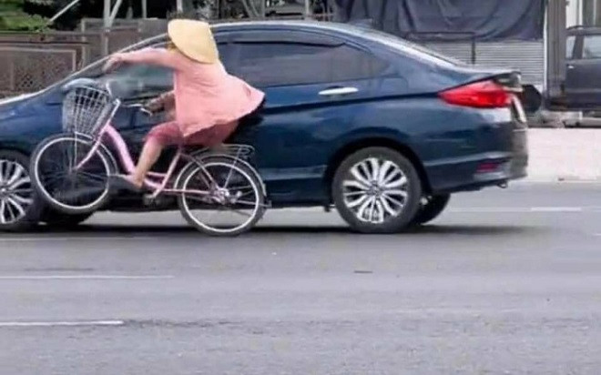 Thông tin bất ngờ về người phụ nữ phóng xe đạp hồng gây 'bão' mạng Ảnh 2