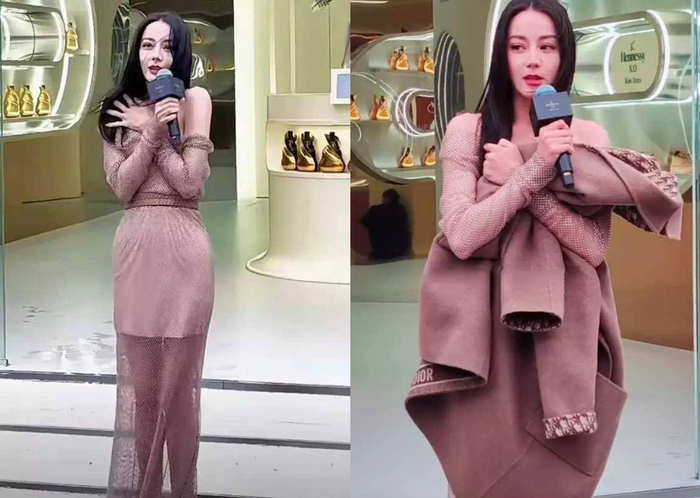 Nhiệt độ khá thấp nên mỹ nhân Tân Cương bị lạnh. 