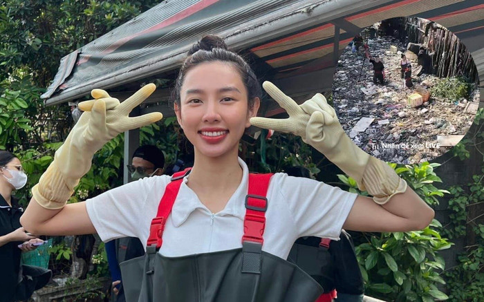 Lộ clip Hoa hậu Thùy Tiên lội dưới dòng kênh đen nghịt ở TP HCM để gom rác Ảnh 2