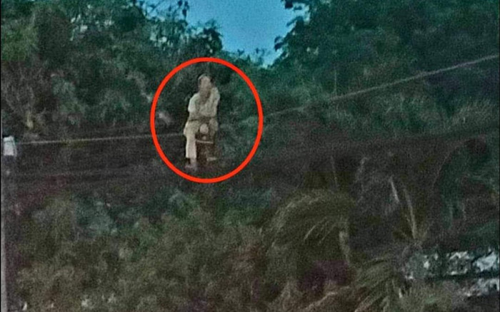 Danh tính bất ngờ người phụ nữ trèo lên dây điện ngồi vắt vẻo gây xôn xao Ảnh 2