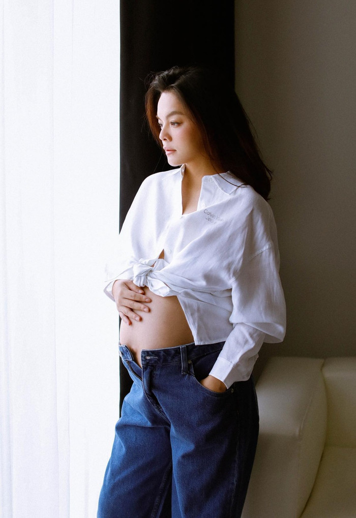  Sao Việt sau khi mang thai: Người 'lui cung' chăm lo gia đình, người vẫn tất bật 'chạy show' Ảnh 13