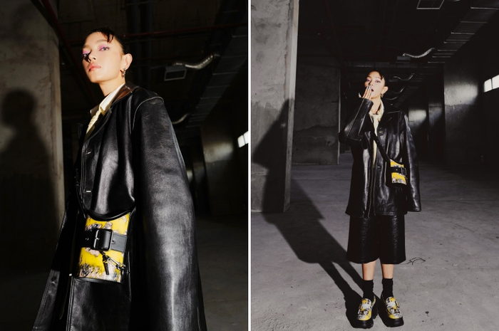 Chiếc túi bucket CHARLES & KEITH của Châu Bùi với hình dáng độc đáo, được thiết kế vàng chanh nổi bật trên nền da màu đen, nhấn nhá lá cẩm thạch và phần khuy bạc gunmetal. 